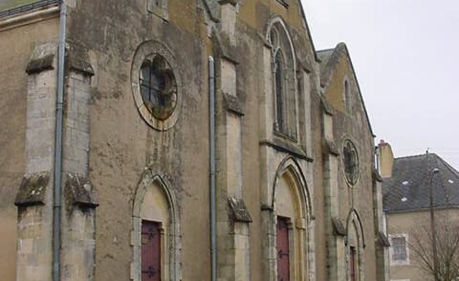 église Saint-Martin de Rouez — Photo : The original uploader was Pretorien0 at French Wikipedia. — CC BY-SA 3.0 — https://commons.wikimedia.org/wiki/File:Eglise_Saint-Martin_de_Rouez-en-Champagne.jpg
